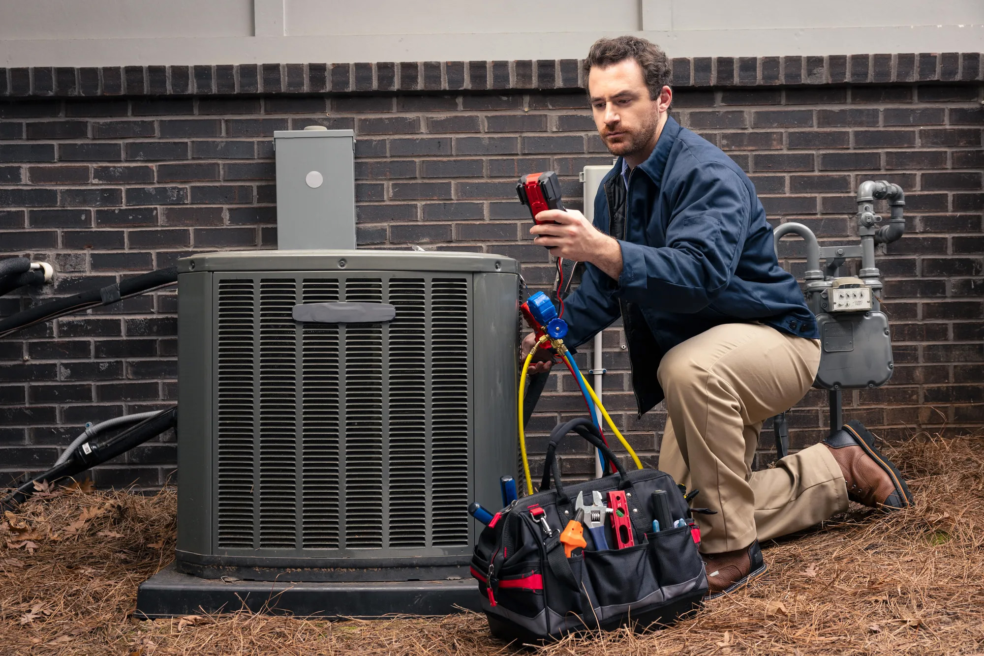 Repair expert performing HVAC system maintenance